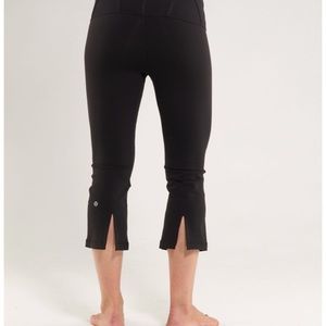Lululemon black Capri with slit up the back calf